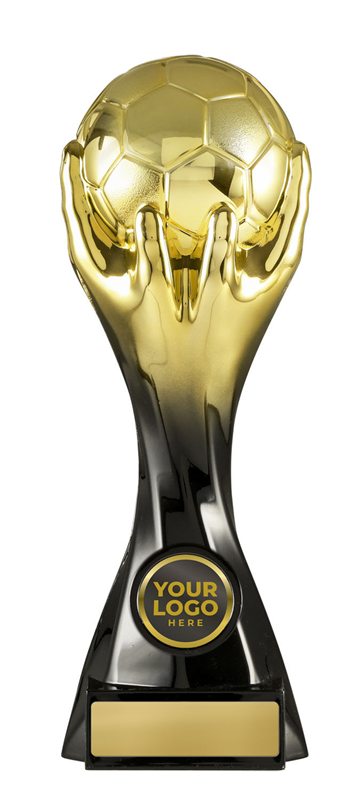 Gold football trophy held in hands on a black base