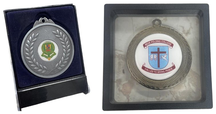 Medal display cases with school crests
